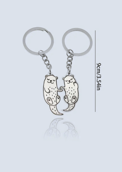 Otters Holding Hands Stainless Steel Matching Keychain Set